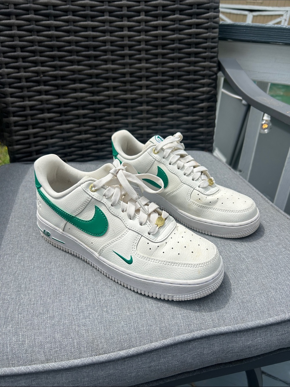 Nike White Sneakers with Green Swoosh Accents